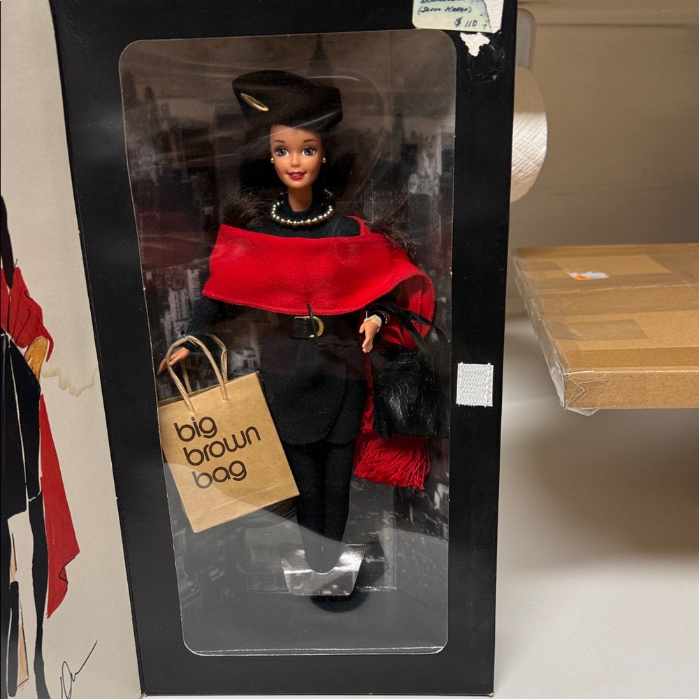 Donna Karan Barbie doll with Brown hair.